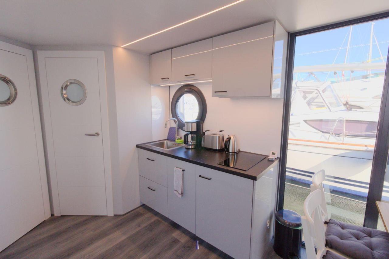 Hausboot Fjord Lacerta Mit Dachterrasse In Wendtorf Εξωτερικό φωτογραφία